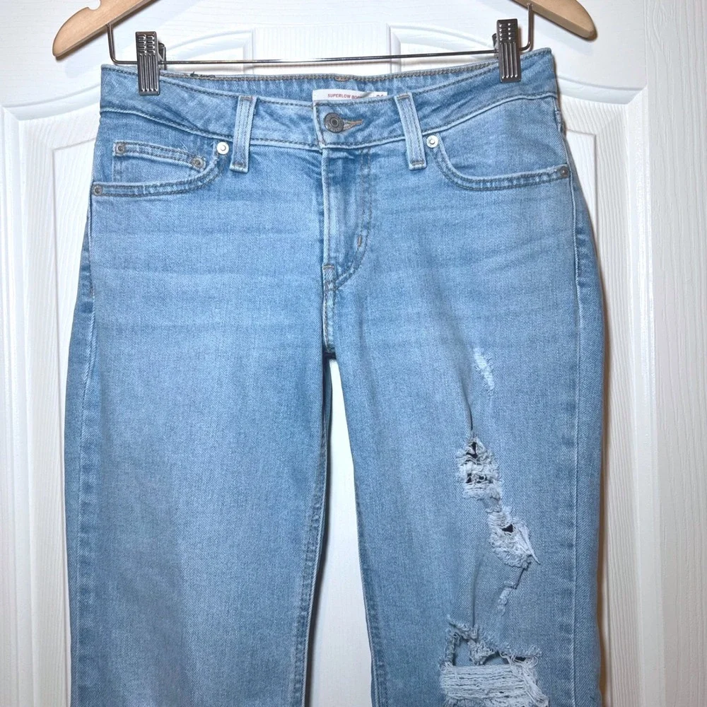 Levis Superlow Bootcut Jeans Light Wash Loose Fit Distressed Low Rise Grunge 26